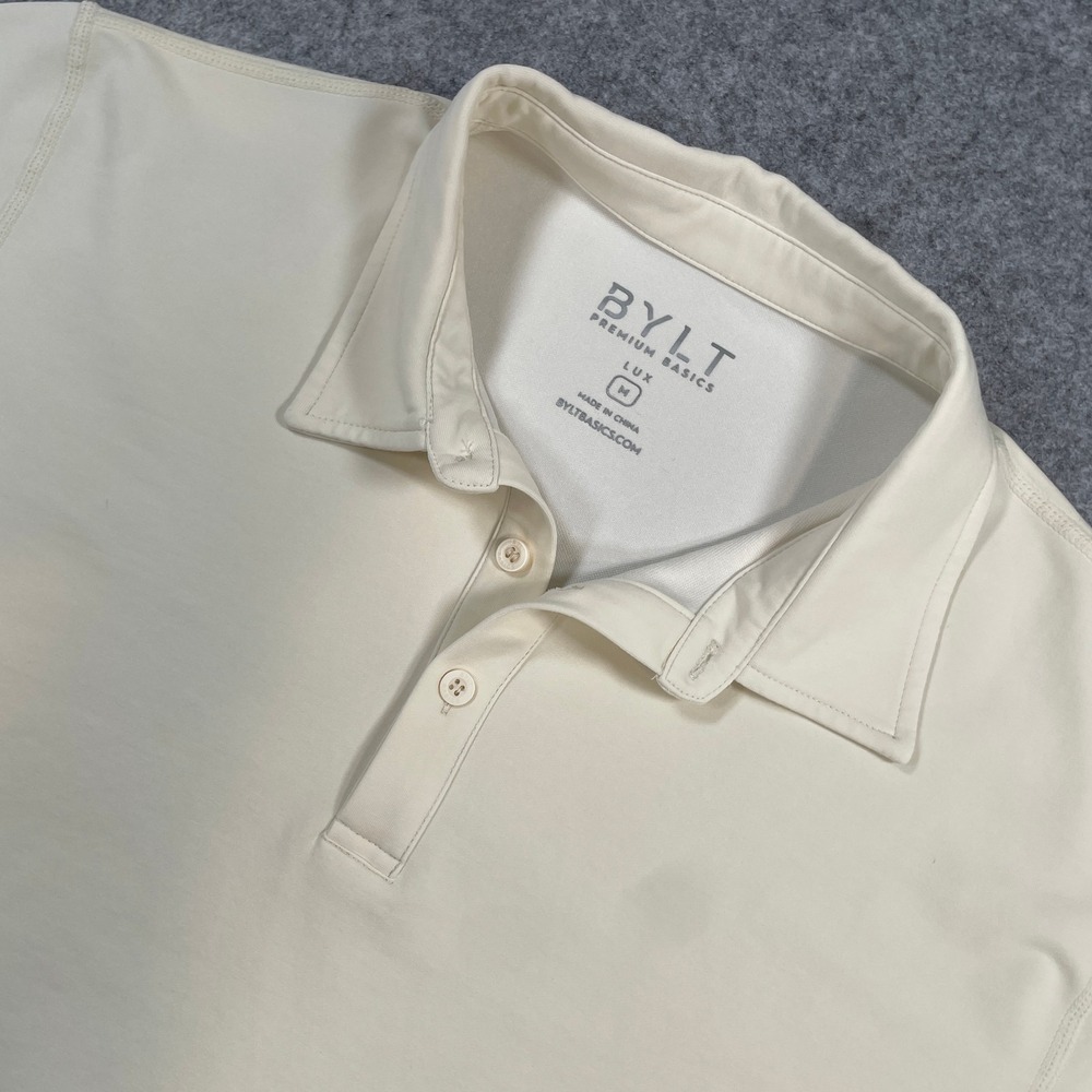 BYLT Mens Lux Polo Size M Cream Short Sleeve Athletic Stretch Curved Hem
